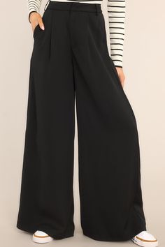 Be the talk of the office in these Office Chic Black Pants! Show 'em who's boss while flaunting your fashion in these timeless versatile black trousers - guaranteed to keep you chic and professional for any occasion. Look effortless when you step into the office. These pants feature a high waist fit, a hook and bar closure, belt loops, pockets, and a wide leg. 100% Polyester Hand Wash Cold Unlined Imported Model is wearing a size small Chic Black Business Bottoms, Black Ankle-length Dress Pants For Business Casual, Chic Solid Color Workwear Bottoms, Black Wide Leg Dress Pants For Business, High Waist Bottoms For Business Casual, Office Lady Style, Sleek Black Wide Leg Pants For Business Casual, Sleek Black Ankle-length Pants, Black High Waist Wide Leg Pants For Work, Black Wide-leg Office Dress Pants