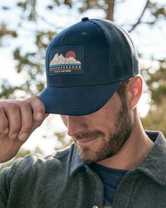 Endlessly versatile and built for adventure, this classic-fit trucker hat is designed to keep you cool and comfortable all day long. The pre-curved brim keeps the sun out of your eyes and off of your face and the back and side mesh panels allow for increased airflow and added ventilation. All-original Americana-inspired Flag & Anthem patch. Adjustable snapback closure. Cotton/poly Imported One size fits most.