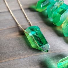 Green Aura Emerald Crystal Stone Necklace- Crystal Necklace- 18k Gold Necklace Chain- Real Gold Necklace- Emerald Crystal- Green Stone **Please Note That Every Stone Will Vary Slightly In Shape/Size/Color As Found In Nature*** Beautifully Radiant Aura Green Crystal Stone Necklace With A Large Crystal Pendant On Elegant Gold Plated Chain. Brilliantly Colorful Pendant, Elegant, And Paired With 18k Gold Plated Stainless Steel Necklace Chain. Colorful Hues Mingle Together To Create This Naturally St Gold Necklace Emerald, Green Aura, Gold Necklace Chain, Real Gold Necklace, Rome Antique, Emerald Crystal, 18k Gold Necklace, Large Crystal, Necklace Crystal