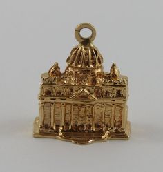 "This is a vintage \"St. Peter's Basilica\" 18 karat gold charm for a charm bracelet.  It weighs 5.90 grams and measures 5/8\" x 3/4\", tested 18K All charms come with a split ring to attach to a bracelet. We have hundreds of charms in stock. If you don't see what you are looking for in our shop please contact us as it is likely we have it. Inventory #G2451" Gold Charm Bracelet As A Souvenir, Antique Gold Charms For Collectors, Antique Yellow Gold Brass Charms, Formal Gold Bracelet With Charms, Victorian Vintage Charm In Yellow Gold, Victorian Yellow Gold Vintage Charm, Antique Hallmarked Charm Bracelet As Gift, Antique 14k Gold Bracelet Gift, Antique 14k Gold Bracelet As Gift