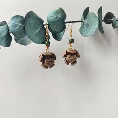 Handmade Pinecone Earrings - Natural Woodland Charm ✨Step into the beauty of the forest with our Handmade Pinecone Earrings. These earrings capture the essence of woodland elegance, featuring real pinecones meticulously preserved and transformed into stunning accessories. Perfect for nature lovers and those who appreciate unique, handcrafted jewelry, these earrings make an exceptional gift for yourself or someone special. Features: 🍃Woodland Beauty:Each pair showcases authentic miniature pineco Nature-inspired Jewelry With Natural Stones, Natural Color Jewelry For Gifts With Pierced Ears, Natural Color Jewelry For Pierced Ears As A Gift, Natural Jewelry For Pierced Ears As A Gift, Earthy Style Drop Earrings With Matching Set, Nature-inspired Natural Stones Jewelry, Handmade Nature-inspired Natural Jewelry, Natural Color Dangle Jewelry For Gifts, Adjustable Earthy Beaded Earrings As Gift