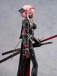 a figurine is posed with two swords