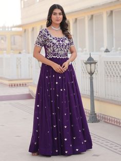 Introducing our captivating purple embroidered georgette function wear gown! This stunning gown is the perfect choice for any special occasion, from festivals to weddings. The gorgeous purple color and sequin embroidery work make this gown a showstopper.
Designed for comfort and style, this gown is fully stitched and available in sizes XS to XXL. The 3.5-meter flair and 56-inch length create a flattering silhouette that will make you feel elegant and confident.
This gown includes intricate sequi Festive Sequined Maxi Dress For Reception, Purple Sequin Floor-length Dress, Diwali Anarkali Gown With Sequins, Anarkali Sequin Gown For Diwali, Purple Georgette Dress With Sequins, Purple Sequin Dress For Eid, Purple Sequined Georgette Dress, Purple Georgette Lehenga For Celebration, Purple Sequined Wedding Dress