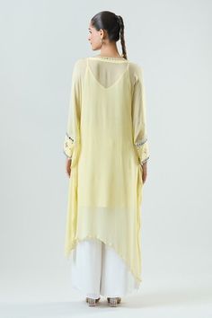 Yellow kaftan with mirror embroidery. Paired with pant and matching inner. - Aza Fashions Embellished Summer Kurta With Traditional Drape, Embellished Straight Kurta For Summer, Anarkali Tunic Kurta With Mirror Work, Anarkali Style Kurta With Mirror Work, Traditional Sets With Mirror Work On Tunic, Designer Wear Mirror Work Kurta Tunic, Designer Wear Tunic Kurta With Mirror Work, Embellished Georgette Kurta For Summer, Mirror Work Pant Set With Straight Kurta