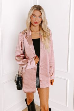 - Elevate your style with this chic satin blazer! Perfect for boss babe energy, whether you're slaying the office or out on the town. It's a must-have for effortless luxe vibes - Sleek material with a satin finish - A built-in lining - A collared v-cut neckline - Long sleeves with faux button accents at the cuffs - Two functional button on the front - A single faux pocket accent cut on the chest - Two low optional pockets that can be un stitched for functional use - A relaxed silhouette that end Fall Satin Notch Lapel Outerwear, Fall Satin Outerwear With Notch Lapel, Notch Lapel Satin Outerwear For Fall, Satin Notch Lapel Outerwear For Work, Notch Lapel Satin Outerwear For Work, Chic Satin Outerwear With Notch Lapel, Spring Satin Outerwear With Long Sleeves, Spring Satin Blazer For Work, Spring Satin Blazer For Workwear