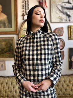 Description: This 90s Vintage Gingham Zip Up Two Piece Set is the perfect addition to any wardrobe. The classic gingham print adds a touch of sophistication, while the zip up design adds a modern twist. Made with high quality material, this set is both classy and fabulous. Available in size small. Size: small Bust: 36” Jacket length: 23.5” Waist: 27” Condition: excellent Label: Doncaster Material:92% Wool 8% Nylon This is a preloved item.