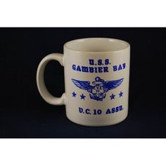 a coffee mug with the u s gamber bar on it