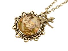 This cute necklace is a lovely gift idea for cat fans. The pendant consists of a flower-shaped setting and a hand-crafted glass cabochon that shows a motif with three kittens. There is also a dragonfly charm above the pendant. The pendant measures 3.6 L x 3.2 W cm. The chain is 45 cm long and can be extended to 50 cm. Charming Nickel-free Jewelry For Gift, Nickel-free Charming Jewelry As A Gift, Nickel-free Charming Jewelry For Gifts, Cute Nickel-free Round Necklaces, Charming Jewelry With Lobster Clasp As Gift, Whimsical Vintage Charm Jewelry As A Gift, Whimsical Jewelry With Vintage Charm As A Gift, Gift Charm Necklace With Vintage Charm, Adjustable Cabochon Necklace As Gift