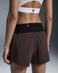 Find your stride in these Running Shorts with a secure inner, adjustable waistband and zipped back pocket. Ultralight, distraction-free. We may have reduced these shorts to the max for lightweight wear, but we also gave you a wide comfortable waistband and the coverage you need for distraction-free running. Finished with a reflective logo, and you're sure to shine after dark. More support, sweat-wicking, and added stretch. Let's say these Running Shorts are multi-talented. The outer uses a four-way stretch polyamide, and elastane blend that's light and fast drying. And the invisible-feel inner brief keeps you comfortable and supported. You need to keep your essentials in close range while going the distance. In this case, extra-close. We've added a center back pocket complete with a secure Women's Running Shorts, Running Trail, Running Shorts Women, Running Workout, Free Running, Adjustable Waistband, Road Running, After Dark, Trail Running