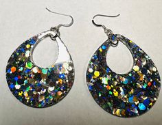 Gorgeous holographic chunky glitter encased in clear resin. Over 2” long. Sterling silver ear-wires. These will surely be noticed! Store Image, Glitter Earrings, Makeup Photography, Special Jewelry, Holographic Glitter, Clear Resin, Model Photography, Ear Wires, Glitter