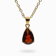 Dark Red Teardrop Garnet Necklace set in 14K Vermeil Gold with Claws made in earth Elegant Teardrop Pendant Necklace For Meditation, Amber Teardrop Birthstone Jewelry, Elegant Teardrop Pendant Jewelry For Meditation, Elegant Teardrop Necklaces For Meditation, Gold Teardrop Gemstones In Sterling Silver, Teardrop Gemstone Pendant For Meditation, Teardrop Gemstone Jewelry For Meditation, Classic Teardrop Gemstone Necklace, Yellow Gold Teardrop Gemstone