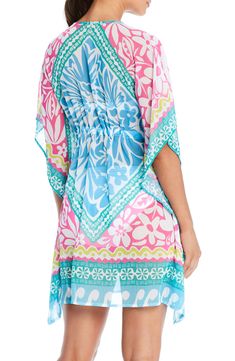 A tropical print emboldens this poolside cover-up topped with a plunging neckline. 33" length (size medium) Plunge neck with ties Slips on over head Elbow-length sleeves 100% polyester Hand wash, line dry Imported Spring Tropical Style Kaftan For Vacation, Spring Vacation Tropical Style Kaftan, Tropical Style Kaftan For Spring Vacation, Spring Vacation Tropical Kaftan, Tropical Spring Vacation Kaftan, Tropical Kaftan For Beach Party In Spring, Tropical Kaftan For Spring Beach Party, Tropical Spring Beach Kaftan, Summer Kaftan For Poolside Vacation