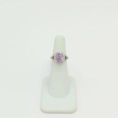 Beautiful light purple 3.53 ct. spinel cushion with 0.84 ct. good quality white diamond rounds.  Handmade in platinum.  Ring size 4.25.  Metal: Platinum Stone: Diamond,Spinel Stone Cut: Cushion Cut  Dimensions reference the ring size and are not specific to the ring itself. Exact ring dimensions are not provided. Please reach in the seller Q&A for questions. Formal Pink Sapphire Rings With Cushion Cut, Formal Pink Sapphire Cushion Cut Rings, Purple Cushion Cut Brilliant Ring, Purple Brilliant Cushion Cut Rings, Purple Diamond Cushion Cut Rings, Purple Cushion Cut Diamond Rings, Purple Diamond Rings With Halo Design, Fine Jewelry Pink Sapphire Ring In Purple, White Cushion Cut Rings With Accent Stones