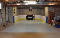 an indoor hockey rink is being constructed with concrete and wood, as well as other equipment