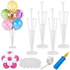 balloons and decorations are arranged on the table