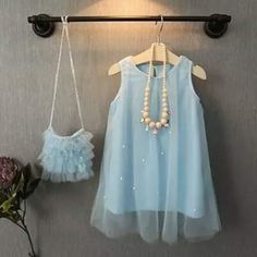 Beautiful Little Girl Dress With Purse Sleeveless Blue Tutu Dress For Dress-up, Light Blue Tutu Dress For Summer Dress-up, Blue Ruffled Tutu Dress For Spring, Light Blue Spring Tutu Dress For Dress-up, Light Blue Tutu Dress For Spring Dress-up, Light Blue Summer Tutu Dress For Dress-up, Blue Sleeveless Tutu Dress For Dress-up, Cute Blue Tutu Dress For Dress-up, Cute Blue Tutu Dress For Spring