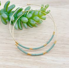 Sea green hoop earrings, boho hoop earrings, beaded hoop earrings, dainty bead hoop earrings, dangle gold earrings, big hoop earrings, hoop earrings, gold hoop, statement hoop earrings, boho dangle hoop These lightweight hoop earrings are so chic to show off your style by wearing them with your hair tucked or low in bun. They are perfect for daily wear in the office or a night on the town.  Perfect gifts for all feminis ❤️ Earrings are enlarge to show details and colors might vary depend on each Green Hoop Beaded Earrings, Green Bohemian Beaded Hoop Earrings, Green Hoop Earrings With Dangling Beads, Handmade Small Green Hoop Earrings, Green Tiny Beads Small Hoop Jewelry, Green Small Hoop Jewelry With Tiny Beads, Green Dangle Hoop Earrings With Tiny Beads, Green Wire Wrapped Hoop Earrings, Green Wire-wrapped Hoop Earrings