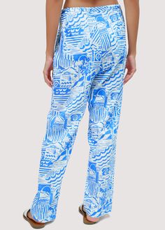 Experience the essence of summer in our Nautical Dream Pants. These lightweight pants are perfect for tropical weather, complete with a drawstring waist and pockets. Coordinate with the matching shirt or a knit top for a chic and feminine look. WPWH04148 Imported Self: 100% Cotton Lining: 100% Rayon Model is 5 ft 9.5 inches; Bust: 32", Waist: 24", Hips: 34" and wearing a size Small Runs true to size Hand wash or wash with gentle cycle with cold water with like colors, Air dry to avoid shrinkage Blue Summer Pants For Beach, Blue Summer Pants For Beach Season, Summer Vacation Blue Pants, Blue Summer Pants For Vacation, Blue Pants For Summer Vacation, Relaxed Fit Beach Pants For Vacation, Blue Beach Pants For Beach Season, Blue Ankle-length Beach Pants, Blue Ankle-length Pants For Beach