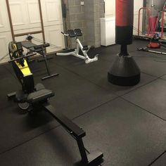 a gym with exercise equipment in the background