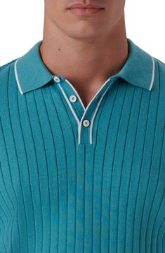 A cotton-rich ribbed knit textures a short-sleeve polo sweater edged in neat contrast for a go-anywhere look. 28" length; 33" chest Spread collar Short sleeves 90% cotton, 10% nylon Dry clean Made in Turkey Men Inspiration, Cuban Shirts, Mens Sweaters, Mens Slip On Shoes, Polo Shirts Men, Mens Sweater, Africa Art, Polo Sweater, Knitwear Men