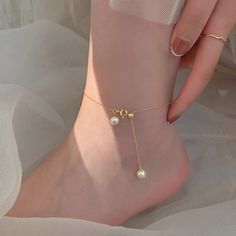 💖 This beautiful pearl anklet features  adorable freshwater pearl and makes a perfect gift for that special person in your life: mom, sister, daughter, in-law, bridesmaids, maid of honor, and more! ♥ This anklet made by AAAA luster high quality freshwater pearl. Simple and classic pearl anklet handmade with 14k gold filled chain. Also there is a 14K gold filled 4mm stopper bead (silicone inside) to make anklet adjustable up to 10 inches.  Materials - One AAAA-quality freshwater pearl with very high luster flawless surface. - Pearl size 6mm-7mm - Chains: 14K Gold Filled/ adjustable up to 10 inches - 4mm 14K Gold Filled stopper bead 14k gold filled jewelry benefits: 1. Anti-allergic unless you are allergic to gold. 2. Affordable alternative to real solid gold. 3. High quality for life long Gold Pearl Anklet With Pearl Charm, Gold Dainty Anklets With Pearl Charm, Dainty Gold Anklets With Pearl Charm, Dainty Pearl Gold Anklets, Gold Pearl Anklets As Gift, Gold Anklets With Pearl Charm As Gift, Gold Anklets With Pearl Charm For Gift, Gold Pearl Anklets For Gift, White Anklets With Pearl Charm As Gift