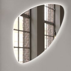 a mirror that is on the side of a wall