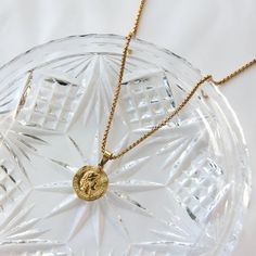 A stylish and casual stainless steel gold coin pendant necklace that will keep its color for a long time when handled with care, perfect for everyday wear and that is safe for your sensitive skin. 💎Free shipping on all orders💎Packaging that is ready to offer as a gift💎Customizable and adjustable chain length The gold coin pendant necklace, a great necklace for daily wear This coin pendant necklace is a great way to express your style. It is trendy and versatile, you can wear it as part of any Gold-plated Medallion Necklace With Gold Chain As Gift, Gold Plated Medallion Necklace With Gold Chain As Gift, Gift Medallion Necklace With Gold Chain, Gift Round Medallion Necklace With Gold Chain, Round Medallion Necklace With Gold Chain As Gift, Yellow Gold Coin Chain Necklace Gift, Yellow Gold Coin Chain Necklace As Gift, Everyday Gold Plated Tarnish Resistant Medallion Necklace, Everyday Gold-plated Tarnish Resistant Medallion Necklace