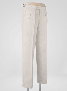 Step up in the sartorial game with our Pure Barn Beige Linen Highland Trousers. Crafted from pure linen, the trousers will carry you through the hot Summer days and crisp evenings with grace, poise, and flair.  
 
 Look Includes   Pure Barn Beige     Linen  Fabric  Cross Pocket  Forward 2 Pleats  Side Tabs (No Loops)- Arrow Shape  Bottom Cuff (1.5")  Two Welted Back Pockets on Trousers   You can change the look during customization if required. 
 
 Lining: Viscose, Dry Clean. Tailored Linen Long Pants, Fitted Linen Bottoms For Semi-formal Occasions, Classic Full Length Dress Pants For Summer, Tailored Beige Linen Pants, Tailored Linen Pants With Pressed Crease, Fitted Linen Pants With Flat Front, Fitted Linen Flat Front Pants, Semi-formal Linen Bottoms For Spring, Elegant Wide Leg Flax Pants