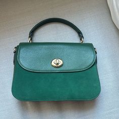 Pristine Condition Never Used. Strap Included. Green Top Handle Shoulder Bag With Magnetic Closure, Green Office Bag With Magnetic Closure, Classic Green Shoulder Bag With Magnetic Closure, Green Satchel Bag With Magnetic Closure, Coach Bags With Magnetic Closure For Office, Elegant Green Coach Satchel, Elegant Green Bag With Magnetic Closure, Chic Green Coach Bag, Coach Green Top Handle Satchel