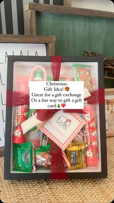 a box filled with candy and candies on top of a table