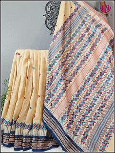 Trending fusion saree with an Amalgamation of skillfully crafted to honor the art from punjab and Maharashtra. This Vidharba Handloom Tussar silk saree features a Ganga Jamuna border with intricate Phulkari embroidery and sequins, making it a trending fashion piece for any occasion. The extensive Phulkari work is done all over the body,border and pallu of the saree. The unstitched blouse comes in Cream with Phulkari embroided. Handloom product Fall and Pico - Done. Blouse - Unstitched. Please no Pre-draped Saree With Border For Navratri, Traditional Saree With Resham Embroidery For Transitional Season, Bohemian Chanderi Saree In Traditional Drape, Multicolor Tussar Silk Saree With Resham Embroidery, Navratri Tussar Silk Traditional Wear With Border, Unstitched Bohemian Saree With Resham Embroidery, Navratri Traditional Chanderi Wear With Border, Unstitched Saree With Border For Navratri, Multicolor Saree With Resham Embroidery For Transitional Season