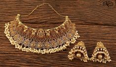 South Indian Necklace With Matte Gold Plating. Indian Bridal Traditional One Gram Jewelry Choker Set. Gorgeous 24 K gold plated. Perfect for Indian weddings. Size- Adjustable Premium Quality and High craftsmanship Gorgeous 22 K gold plated. Beautiful and elegant Kemp necklace. All the raw material used in this product is of high quality and is handcrafted with love. Premium Quality and High craftsmanship 100% Satisfaction Guarantee: Long Lasting Plating, High-Quality Stones. Gifting: This pair o Dual-tone Kundan Temple Necklace For Wedding, Traditional Dual-tone Kundan Necklace For Wedding, Heavy Gold Bridal Necklace In Temple Jewelry Style, Gold Dual-tone Kundan Necklace For Wedding, Dual-tone Kundan Necklace For Wedding In Temple Jewelry Style, Dual-tone Kundan Temple Jewelry Necklace For Wedding, Dual-tone Temple Necklace Chandbali For Wedding, Gold Temple Necklace With Stone Work For Diwali, Temple Jewelry Sets In Dual-tone For Weddings