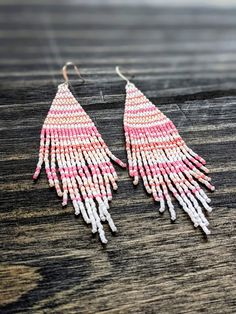 Handmade Pink Beaded Earrings For Beach, Pink Dangle Beaded Earrings For Festival, Summer Beach Fringe Earrings, Pink Beaded Fringe Earrings For Festival, Pink Beaded Drop Earrings For Festivals, Summer Beach Tassel Earrings With Beaded Fringe, Pink Beaded Fringe Jewelry For Festival, Pink Festival Earrings With Colorful Beads, White Tassel Earrings For Summer Festivals