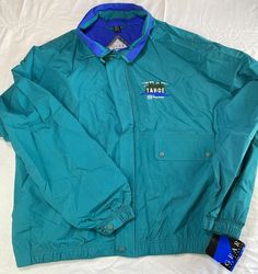 This vintage windbreaker jacket is a pop of color for any sports enthusiast's wardrobe. Made of nylon material, it features a teal and purple color combination that is sure to make a statement. The jacket is sized as L and measures 26x30 inches, making it a regular fit for men. Its islander vibe is perfect for those who love island life or vintage clothing. It's a great addition to any collection and is sure to turn heads. Don't miss the opportunity to own this unique jacket from Hong Kong. Purple Color Combinations, Vintage Windbreaker Jacket, Unique Jackets, Vintage Windbreaker, Love Island, Windbreaker Jacket, Brands Outlet, Purple Color, Color Combinations