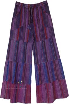 A pair of purple-toned cotton wide-leg pants. With a drawstring waist, these pants ensure absolute comfort - the pattern is stitched in four progressive patches and they increase in girth towards the hem making them wide leg on the final layer. #tlb #SplitSkirtsPants #WideLegCulottes #Patchwork #Striped #BohemianPants Purple Full Length Wide Leg Pants With Pockets, Purple Cotton Wide Leg Pants With Pockets, Purple Wide Leg Cotton Pants With Pockets, Purple Cotton Wide Leg Pants, Purple Cotton Pants With Pockets, Purple Full-length Cotton Pants, Purple Full Length Cotton Pants, Multicolor Cotton Wide Leg Pants With Pockets, Purple Cotton Wide Leg Pants For Spring