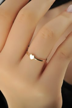 14K Solid Gold Tiny Heart Ring, Valentine Heart Ring, 14k Solid Gold Cute Simple Chic Heart Ring, Minimalist Dainty Stackable Ring, Promise Ring, Gift For Her, Best Quality, Affordable Prices. Ring Features: ✪ 14K Solid Gold (also in 8, 9, 10, 18K) ✪ Band Options: Yellow Gold, White Gold, Rose Gold ✪ Top Width: 4.53x4.77 mm ✪ Band Width: 1.20 mm ✪ Ready to Ship in 4-7 Business Days ✪ Due to their custom nature measures of the gold material may vary a little. 🛠 Joy Jewelry Jewels' pieces are han Cute Minimalist Jewelry, Pretty Rings Simple Gold, Dainty Heart Ring, Minimalistic Gold Rings, Dainty Heart Ring With Simple Design For Promise, Dainty Gold Heart Ring For Promise, Dainty Simple Design Heart Promise Ring, Minimalist White Heart Ring For Anniversary, Simple Heart Promise Ring For Valentine's Day