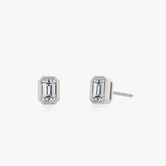 The Bezel Solitaire Studs combine vintage-inspired detail and modern appeal together for a look that’s timelessly elegant. Solitaire Studs, Emerald Earrings, Emerald Cut, Diamond Shapes, Solid Gold, Cufflinks, Vintage Inspired, Emerald, White Gold