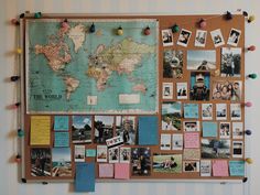 a bulletin board covered in pictures and post it notes with pins on the wall next to it