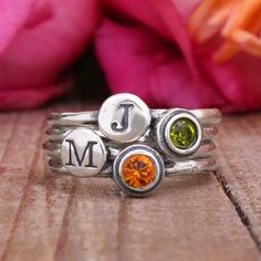 For Mother's Day, use your imagination and creative skills to design a personalized stacking ring for mom. Learn more here! Birthstone Ring Stack, Mother Ring, Bff Rings, Mothers Rings, Initial Rings, Stackable Birthstone Rings, Birthstone Ring Mothers, Mother's Ring, Gold Diamond Wedding Rings