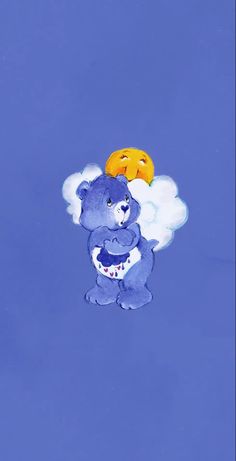 there is a blue teddy bear floating in the sky