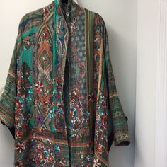 Exquisite Embroidered Jacket. Lightweight. Seldom Worn. This Jacket Is Sized Small But Runs Very Large Bohemian Long Sleeve Floral Print Outerwear, Patterned Long Sleeve Outerwear For Spring, Patterned Long Sleeve Spring Outerwear, Spring Open Front Outerwear With Floral Embroidery, Spring Outerwear With Floral Embroidery And Open Front, Green Floral Print Outerwear For Fall, Green Floral Print Fall Outerwear, Oversized Long Sleeve Embroidered Outerwear, Green Long Sleeve Outerwear With Floral Print