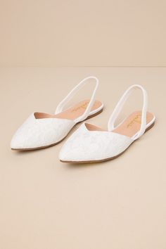 Step into style with the Lulus Mae White Lace Pointed-Toe Slingback Flats! These sweet cuties are the perfect blend of chic and sensible with their low-maintenance flat sole, comfortable elastic slingback strap, and cute notched pointed-toe upper composed of romantic floral lace. 0. 25" rubber heel. Lightly cushioned insole. Felted rubber sole has nonskid markings. Man made materials. Imported. Lulus | Mae White Lace Pointed-Toe Slingback Flats | Size 6.5. Comfortable Wedding Shoes For Bride Ballet Flats, Bridal Shoes No Heel, Flat Wedding Shoes For Bride Boho, Wedding Shoe Flats, White Bride Shoes, White Slingback Flats, Wedding Flats For Bride Sandals, Wedding Shoes No Heel, Flat Wedding Shoes For Bride