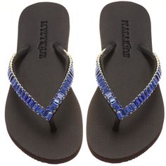 a pair of blue and white crystal sandals