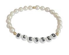 Embrace your blessings with this stunning Pearl Bracelet. Each delicate Pearl represents a symbol of purity, wisdom, and spiritual growth. Let this beautiful piece serve as a constant reminder of the blessings that surround us and the infinite potential within. 8mm quality freshwater pearls gold plating stretch bracelet handmade available in a variety of sizes Classic White Jewelry With Si Clarity, Spiritual Pearl Bracelet With 8mm Beads, Spiritual 8mm Pearl Beads Bracelet, Inspirational White Bracelet Jewelry, White Spiritual Bracelets With Pearl Charm, Spiritual White Bracelets With Pearl Charm, Meaningful Hypoallergenic White Bracelets, Meaningful White Jewelry With Letter Beads, Everyday Inspirational Round Bead Jewelry