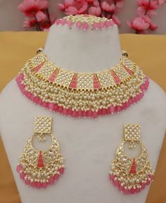 Occasion might be any, getting ready In a Sophisticated Manner Is Women'S Thing that they enjoy the most Pink Beads Pearls Kundan Choker Necklace Earrings Tikka Jewelry/ Indian Bridal Pearls Jewelry/ Gold Plated Kundan Necklace/ Women Necklace ITEM DESCRIPTION Metal = Gold Plated Occasion = Wedding ,Party Wear, Bridal Color = Clear and Pink Size = Necklace Length = 8 Inches, Earrings/Studs Size = 2.5 Inches Tikka = 5 Inches 100% Satisfaction Guarantee: 1 Year Warranty, Long Lasting Plating, High Pink Round Kundan Necklace For Celebration, Pink Bollywood Kundan Necklace For Celebration, Luxury Pink Kundan Necklace For Parties, Pink Kundan Choker For Party, Elegant Luxury Pink Kundan Necklace, Pink Bollywood Kundan Necklace, Festive Pink Meenakari Choker, Tikka Jewelry, Party Mode