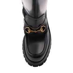 The Horsebit detail is a key Gucci motif, appearing throughout the house's collections. It can be seen to the front of these boots, speaking to the equestrian inspiration behind the pair.Signature Horsebit detailPanelled designRound toeSide zip fasteningKnee-highChunky rubber soleLow block heel ~1.73"Composition: Leather 100%Sole: Rubber 100%Lining: Leather 100%Made in Italy Designer Boots With Horsebit Detail For Formal Occasions, Designer Knee-high Boots With Round Toe For Work, Luxury Round Toe Platform Boots For Work, Designer Gucci Boots For Fall, Designer Formal Boots With Horsebit Detail, Gucci Calf Leather Boots For Fall, Luxury Knee-high Boots With Round Toe For Office, Gucci Formal Boots For Fall, Gucci Luxury Heeled Boots For Formal Occasions