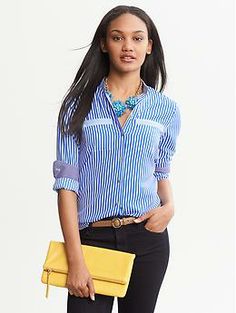 Vertical Stripe Blouse Chic Workwear Blouse With Roll-up Sleeves, Chic Blouse With Roll-up Sleeves For Work, Collared Blouse With Pockets For Day Out, Chic Shirt With Roll-up Sleeves For Work, Chic Workwear Shirt With Roll-up Sleeves, Collared Office Blouse With Pockets, Blue Blouse With Pockets For Work, Office Collared Blouse With Pockets, Workwear Blouse With Collar And Pockets