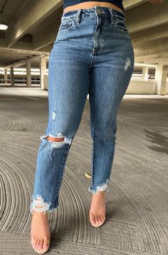 Elevate your style with our Frayed Slim Straight Jean, combining vintage-inspired charm and comfort. The cotton front panel provides a timeless rigid denim look, while the butt-hugging lift on the back ensures a flattering fit. With its slim straight leg design, distressed details, and frayed hems, these jeans are a versatile and stylish choice for any occasion, making them a must-have addition to your wardrobe. This denim has some stretch to itMeasurement (based on size 5)- Inseam: 27"- Rise: 1 High Rise Fitted Ripped Cropped Jeans, Ripped High Rise Fitted Cropped Jeans, Fitted High Rise Ripped Cropped Jeans, Fitted Cutoff Rigid Denim Jeans, Chic Ripped Bottoms For Everyday, Chic Everyday Ripped Bottoms, Medium Wash Distressed Mom Fit Bottoms, Distressed Medium Wash Mom Fit Bottoms, Distressed Mom Fit Medium Wash Bottoms