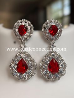 Material: brass and stones Color : red and silver handmade jewelry from India Silver Handmade Jewelry, Red And Silver, Front Yard Landscaping Design, Zurich, Stone Earrings, Handmade Silver, Stone Color, Jewelry Earrings Dangle, Dangle Drop Earrings