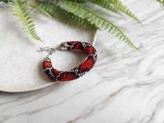 This bright red snake jewelry set will be an interesting gift idea for sister. More snake jewelry you will find in my: shop www.etsy.com/shop/KristoferShop This beaded snake bracelet is crochet from Czech and Japanese beads. Length of snake bracelet/necklace with clasp. You can choose your length.  DELIVERY The product will be manufactured and sent within 3-5 days bracelet or 5-7 days jewelry set. * After sending, I will send you a track code on which you can track the movement of your order. Du Handmade Snake Bracelet For Gift, Red Bohemian Crochet Jewelry, Handmade Snake-shaped Bohemian Jewelry, Handmade Bohemian Snake Jewelry, Handmade Bohemian Snake-shaped Jewelry, Handmade Snake-shaped Beaded Necklace For Gift, Unique Handmade Snake-shaped Jewelry, Red Snake-shaped Jewelry For Gifts, Red Crochet Jewelry As A Gift